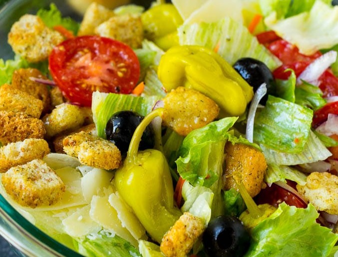 Garden salad with banana peppers, olives, and tomatoes